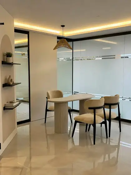 Interior of ORA Dental Wellness atelier in Bahria Town Phase 4, with arched alcoves and soft lighting